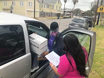 woman getting package to the car