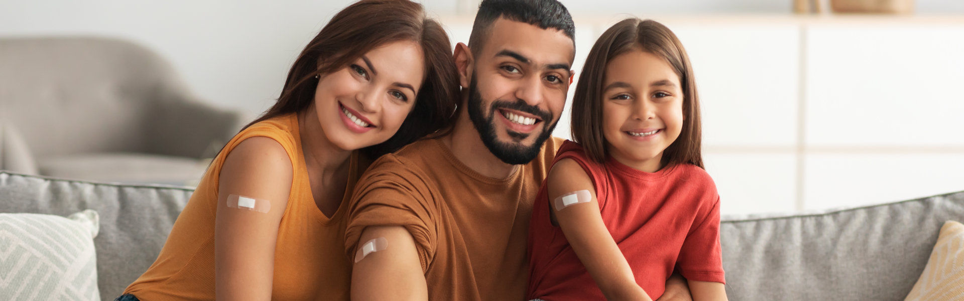 happy family getting a vaccine